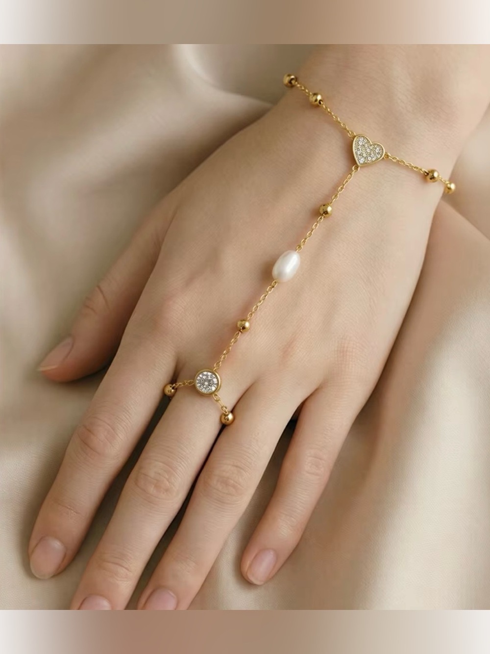 Sara Sotti Gold or Silver Natural Pearl Heart Hand Chain Bracelet